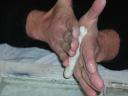 Knead and roll out a worm of putty