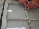 Draw putty smooth with knife