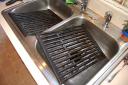 clean the grates in the sink