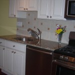 The new kitchen sports a built in dishwasher, gas/convection stove, granite and a tile backsplash. The new kitchen sports a built in dishwasher, gas/convection stove, granite and a tile backsplash.